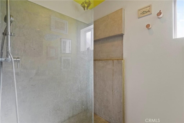 bathroom featuring walk in shower