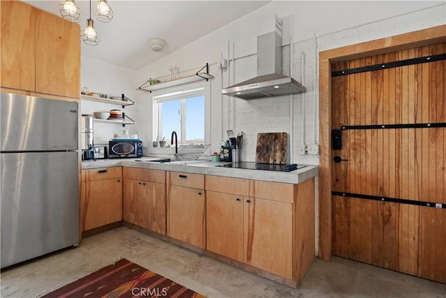 kitchen with open shelves, a sink, black appliances, concrete flooring, and wall chimney exhaust hood