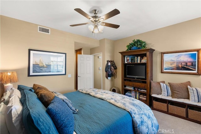 bedroom with a ceiling fan, visible vents, and carpet flooring