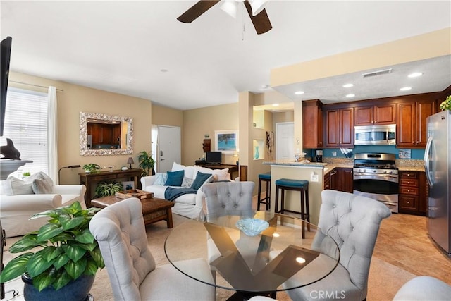 dining space featuring recessed lighting, visible vents, ceiling fan, and light tile patterned flooring