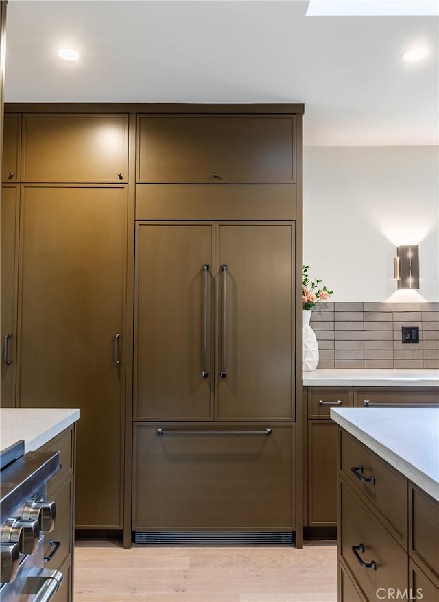 interior space featuring light countertops, light wood-style flooring, and recessed lighting