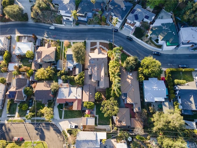 birds eye view of property with a residential view