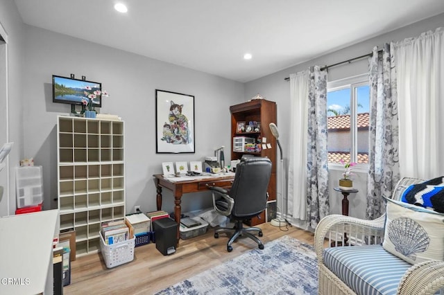 office area with recessed lighting and wood finished floors