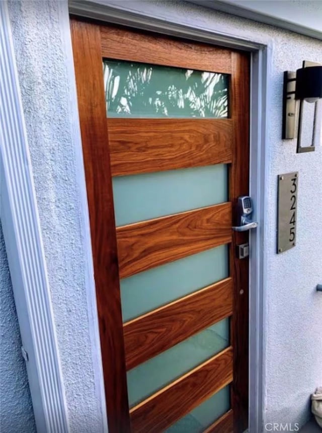 details featuring stucco siding