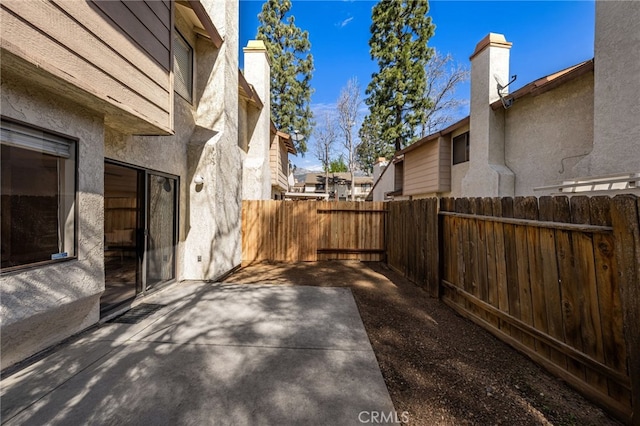 view of patio with a fenced backyard