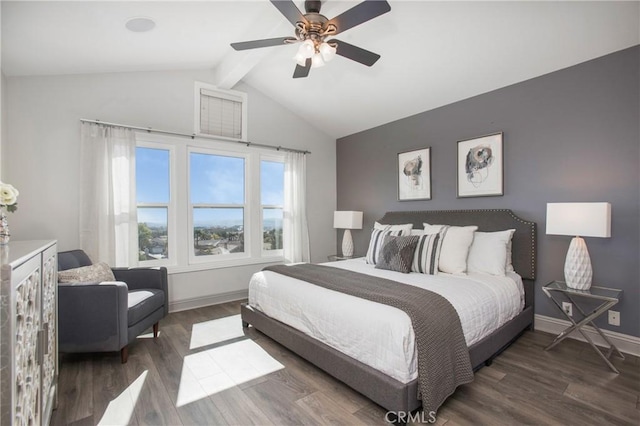 bedroom featuring a ceiling fan, lofted ceiling with beams, baseboards, and wood finished floors