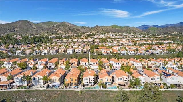 bird's eye view with a residential view and a mountain view