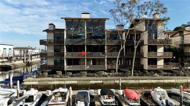 view of property with a water view