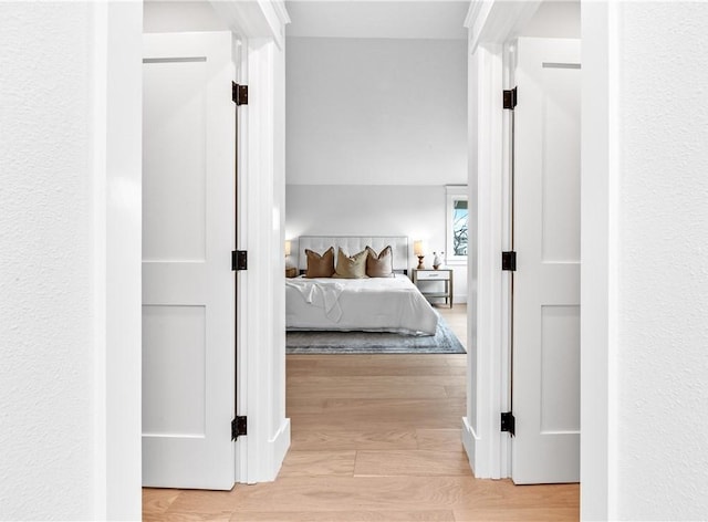 bedroom with light wood-type flooring