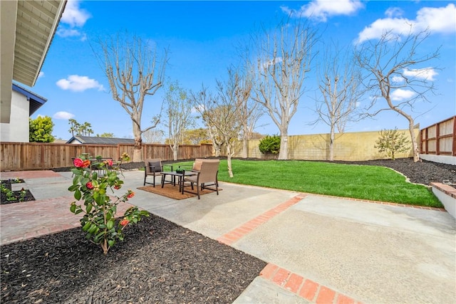 view of patio featuring a fenced backyard