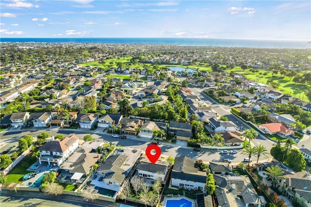 birds eye view of property with a residential view