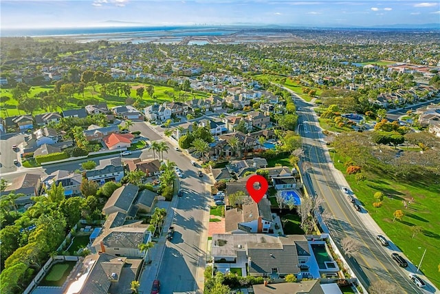 birds eye view of property with a residential view