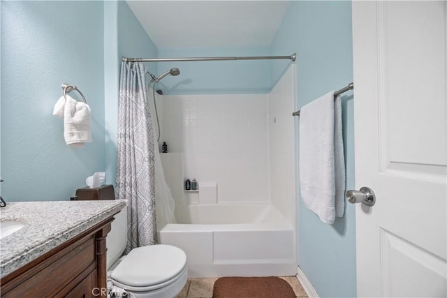 full bath featuring vanity, shower / bath combination with curtain, and toilet