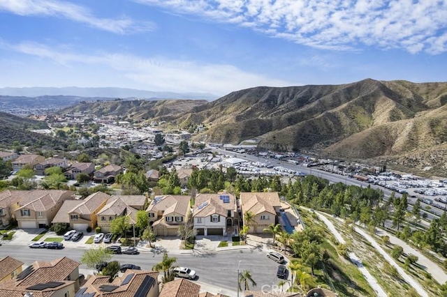 bird's eye view featuring a residential view and a mountain view