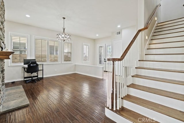 home office featuring french doors, recessed lighting, visible vents, wood finished floors, and baseboards