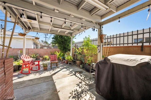 view of patio / terrace featuring grilling area and a fenced backyard