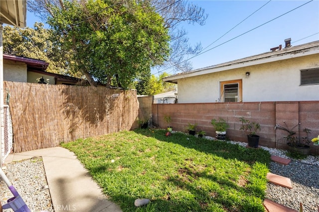 view of yard with fence