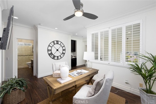 home office with baseboards, wood finished floors, and crown molding