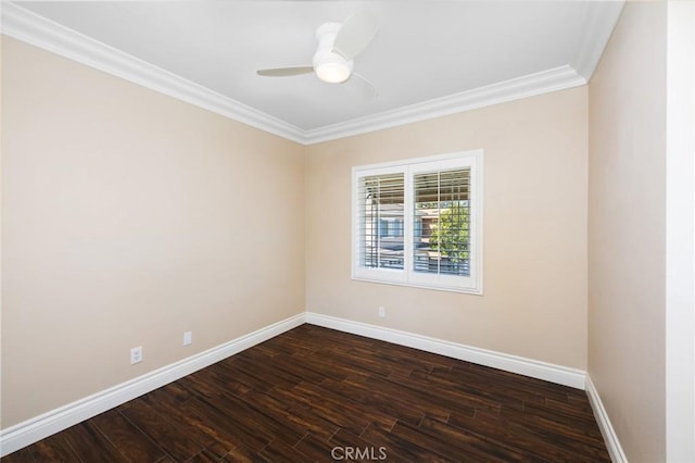 spare room with a ceiling fan, dark wood-style floors, baseboards, and ornamental molding