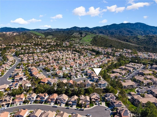 bird's eye view featuring a residential view and a mountain view