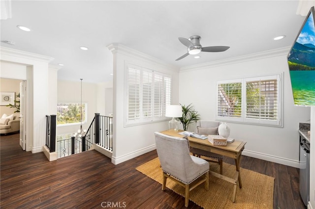 dining area featuring baseboards, a healthy amount of sunlight, dark wood finished floors, and crown molding