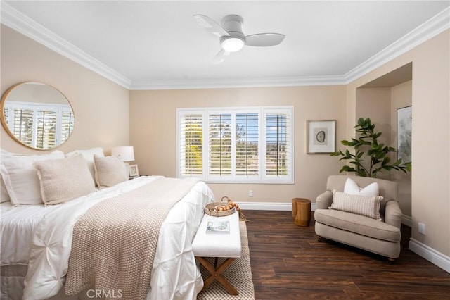 bedroom featuring baseboards, a ceiling fan, wood finished floors, and crown molding