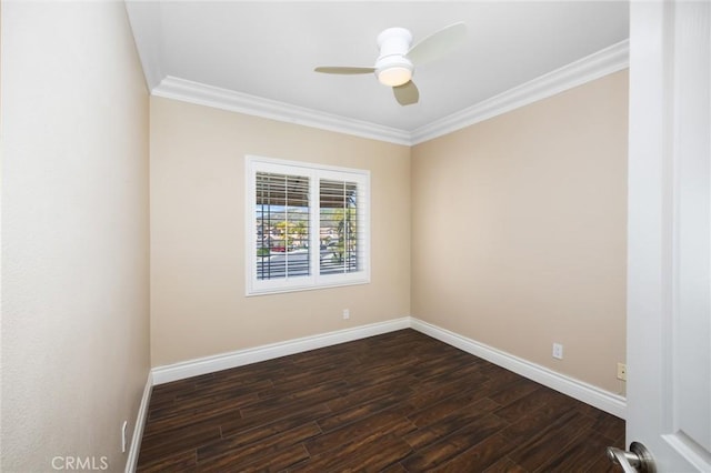 unfurnished room with baseboards, a ceiling fan, dark wood finished floors, and crown molding