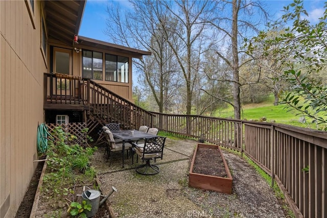 view of yard featuring a vegetable garden and fence