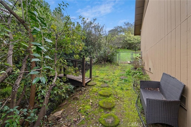 view of yard featuring fence