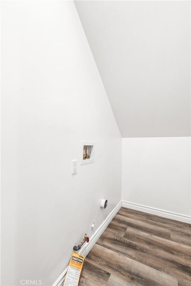 laundry area with baseboards, gas dryer hookup, laundry area, hookup for a washing machine, and wood finished floors