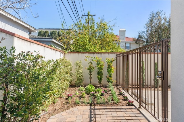 exterior space featuring a fenced backyard