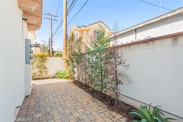 view of patio / terrace featuring fence