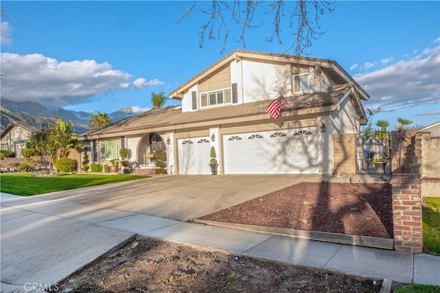 view of front of home featuring a garage and concrete driveway