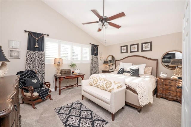 carpeted bedroom with lofted ceiling and a ceiling fan