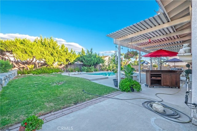 view of patio with a fenced in pool and a fenced backyard