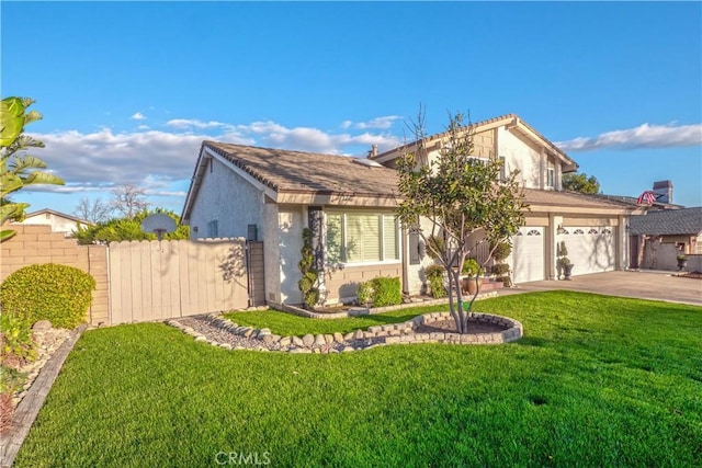 view of front of property featuring stucco siding, concrete driveway, an attached garage, a front yard, and fence