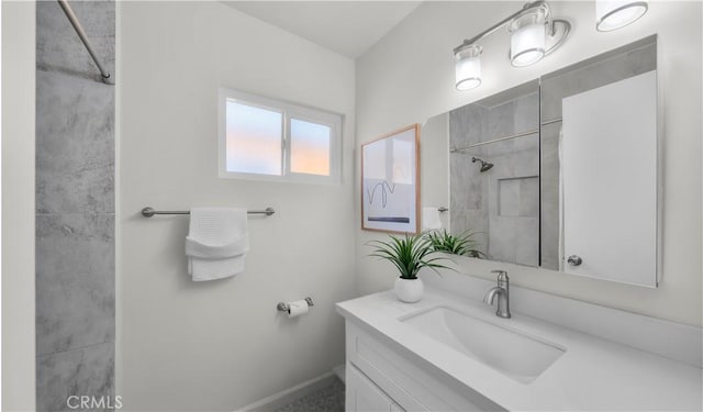 full bathroom featuring vanity and a shower