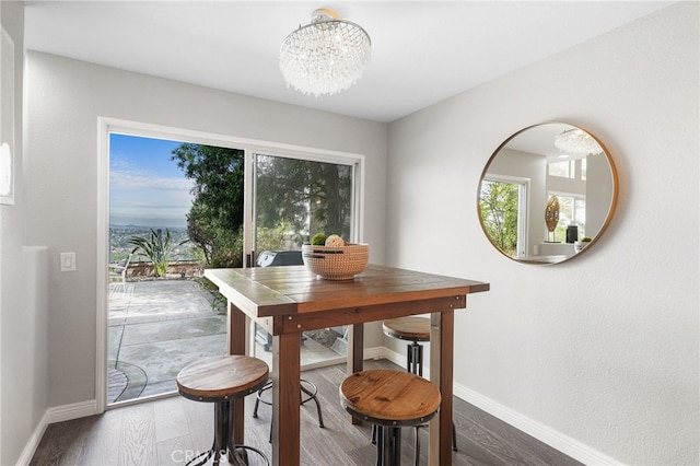 29416 Port Royal Way, Laguna Niguel, CA 92677 - dining space featuring baseboards, wood finished floors, and a chandelier