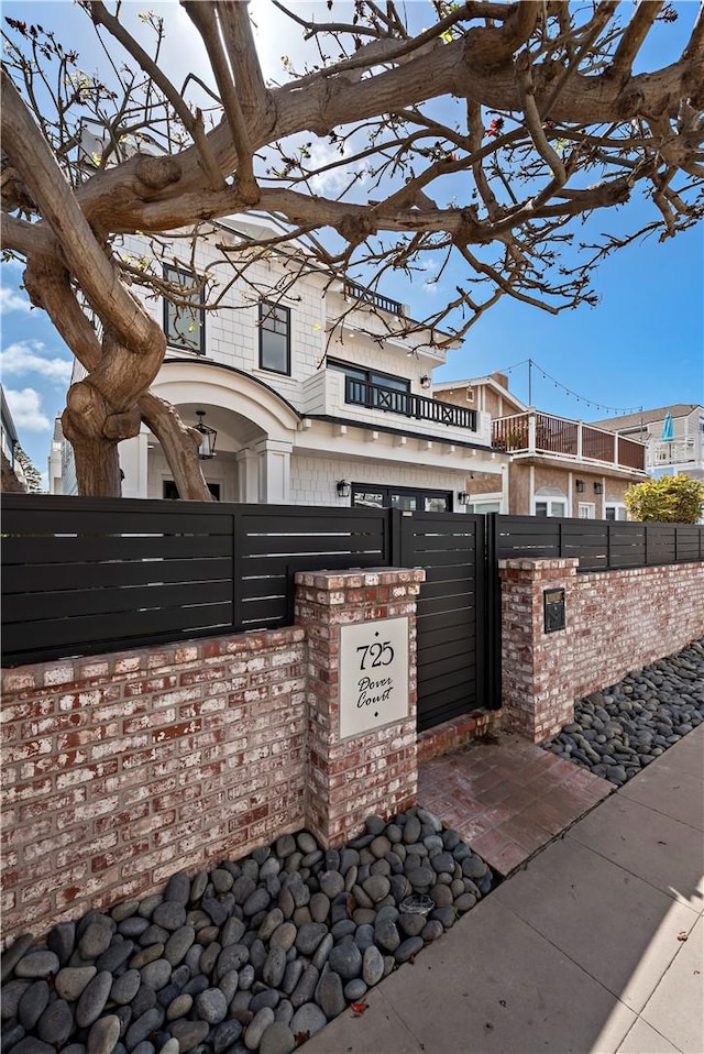 exterior space with fence and a gate