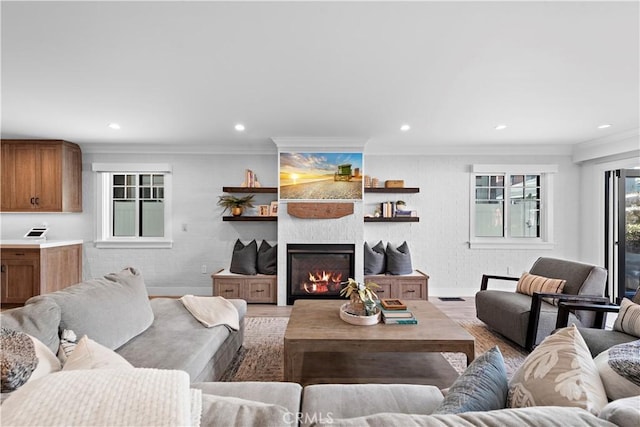 725 Dover Ct, San Diego, CA 92109 - living room with recessed lighting, crown molding, a fireplace, and light wood-type flooring