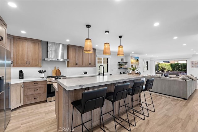 725 Dover Ct, San Diego, CA 92109 - kitchen featuring wall chimney range hood, appliances with stainless steel finishes, light countertops, and recessed lighting