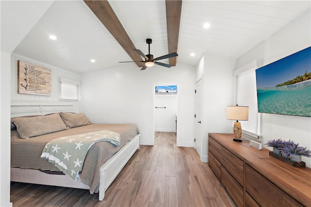 bedroom with vaulted ceiling with beams, recessed lighting, wood finished floors, a ceiling fan, and baseboards