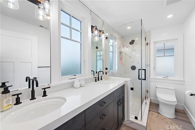 725 Dover Ct, San Diego, CA 92109 - full bath with toilet, visible vents, a sink, and a stall shower