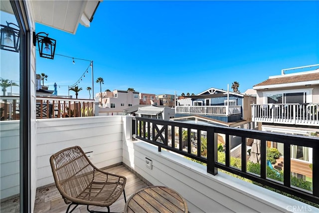 balcony featuring a residential view