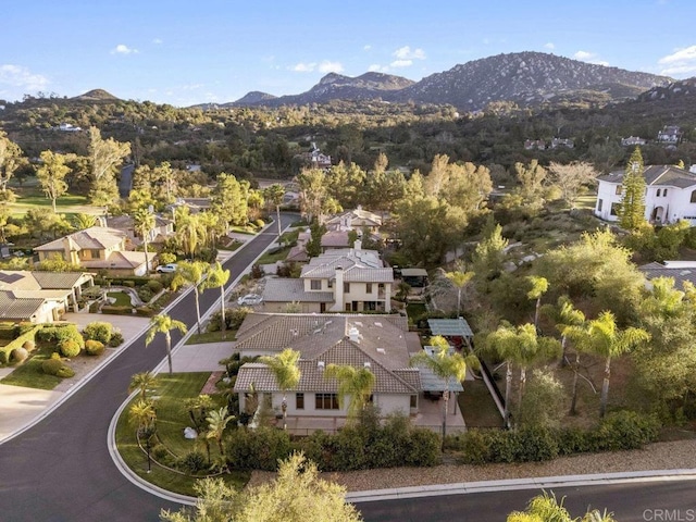 bird's eye view featuring a residential view and a mountain view