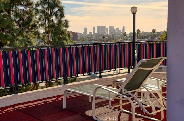 balcony featuring a city view