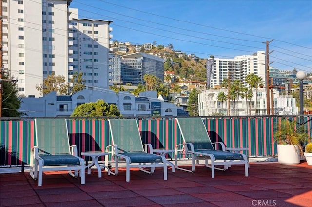 view of patio with a city view