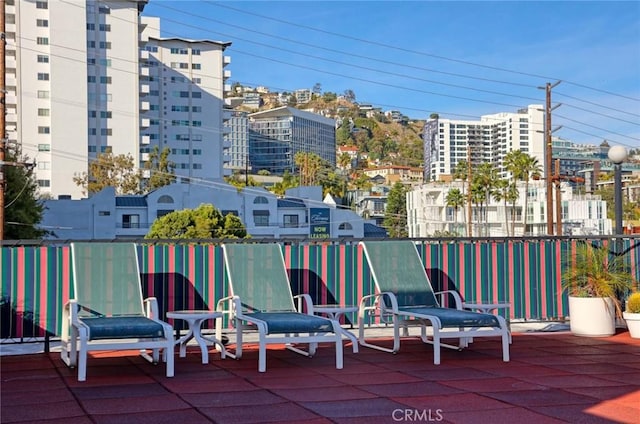 view of patio / terrace featuring a view of city