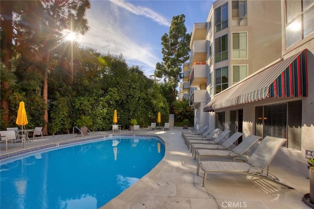 pool with a patio area