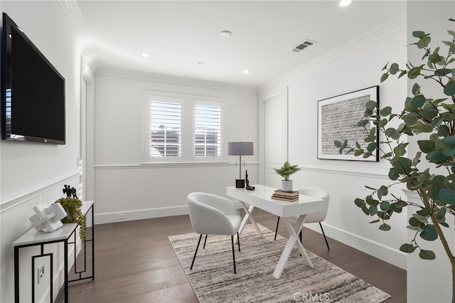 office featuring baseboards, visible vents, dark wood finished floors, and crown molding